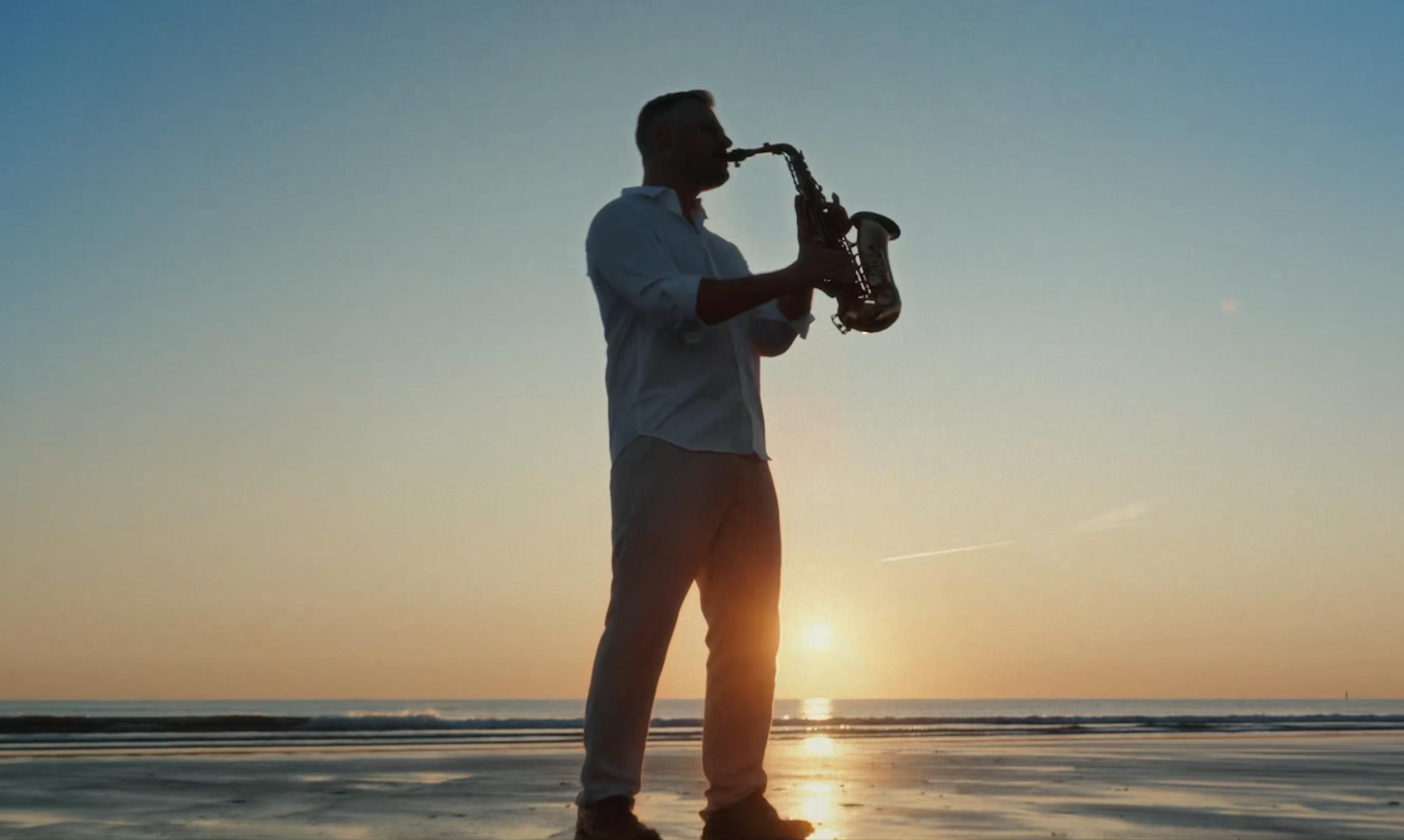DJ Alex Sax on the beach